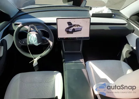 2026 Tesla Model Y из США, поврежденный, VIN 7SAYGDED9TF386962